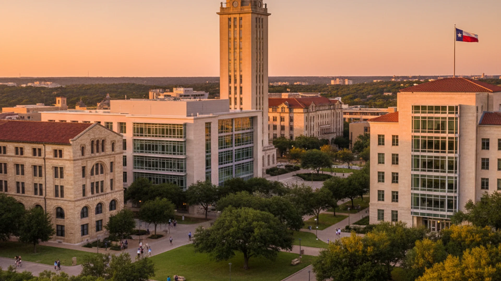 Texas university campus with modern buildings and live oak trees under clear skies